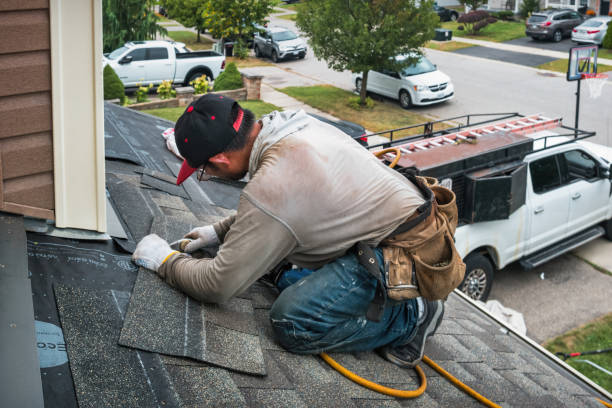 Professional Emergency Roof Repair technician working in East Lansing, MI